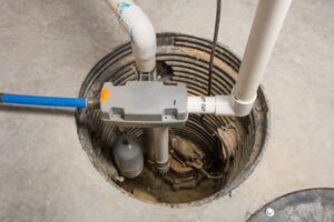 A picture of a sump pump in a basement