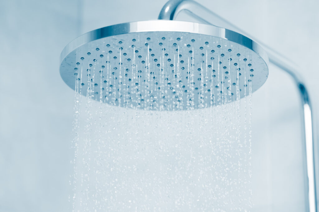 Water falling from a shower head.